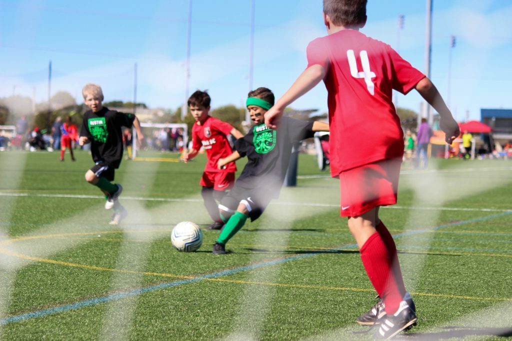 boy's playing soccer